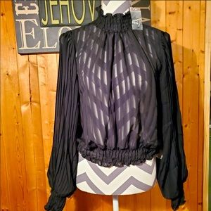 NWOT. SEXY BLACK BLOUSE